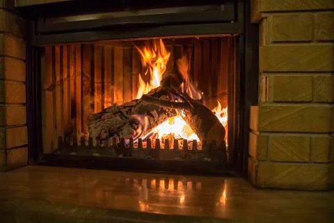 Burning fireplace. Stock Photos