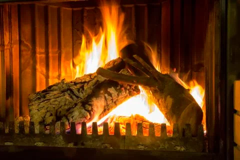 Burning fireplace. Stock Photos