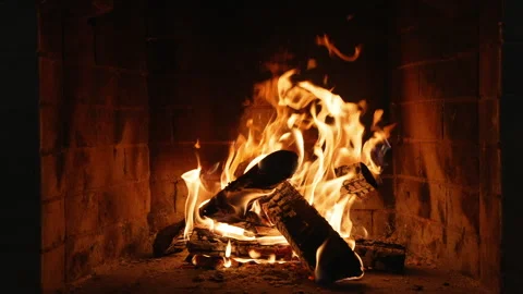 Burning Fireplace Providing Warmth and Comfort. Flames Dancing and Creating a Video stock 329611111