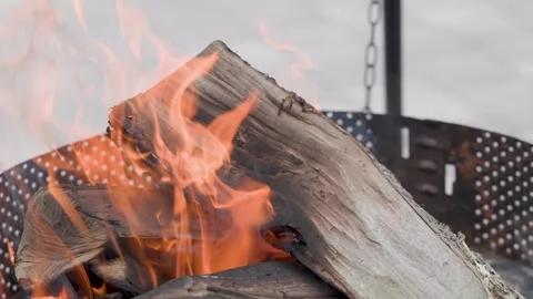 Burning firewood close up for fireplace background with glowing flames and Stock Footage 337042659