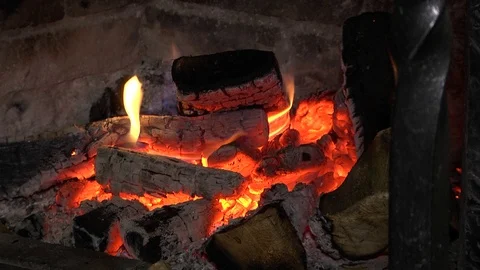 Burning firewood fire close-up. Bonfire burning brightly, heat, light. Stock Footage 122697255