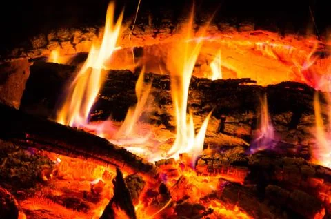 Burning firewood on fire Stock Photos