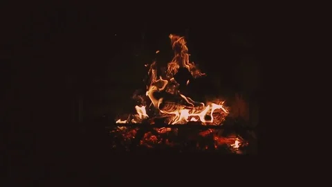 Burning firewood in a fireplace Stockbeeldmateriaal 72129770
