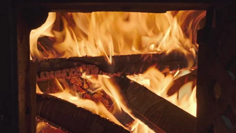 Burning firewood inside hearth with bright flames Stock Footage 344744547
