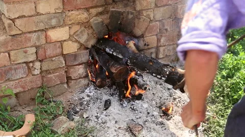 Burning firewood in kiln Stock Footage 64307302