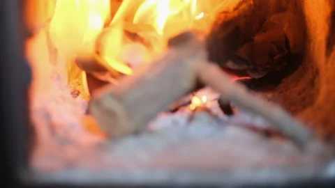 Burning firewoods in an oven fire-box Stock Footage 229647416