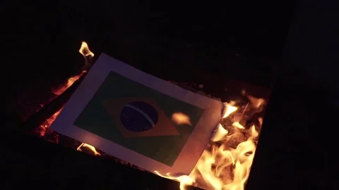 Burning the flag of Brazil Stock Footage 75916635