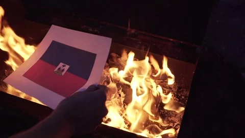 Burning the flag of Haiti Video stock 75914491