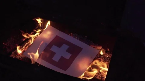 Burning the flag of Switzerland Video stock 75915588