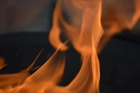 Burning flame, abstract background. Bright orange fire. Heat, fire, fireplace Foto stock