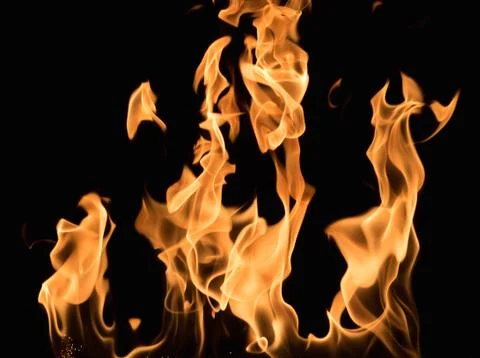 Burning flame on black background Stock Photos