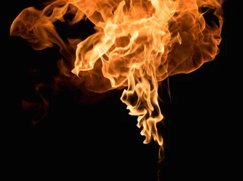 Burning flame on black background Stock Photos