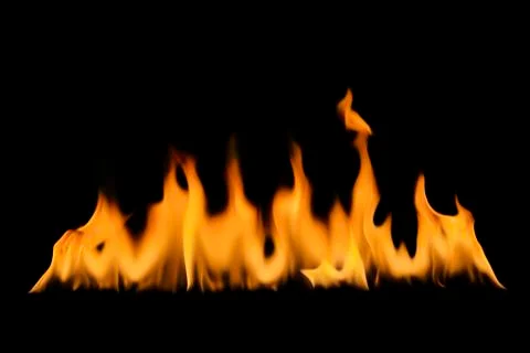A burning flame On a black background Stock Photos