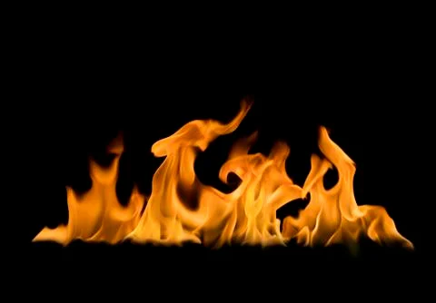 A burning flame On a black background Stock Photos