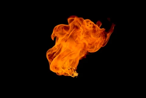 A burning flame On a black background Stock Photos