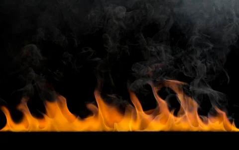 Burning flame On a black background Stock Photos