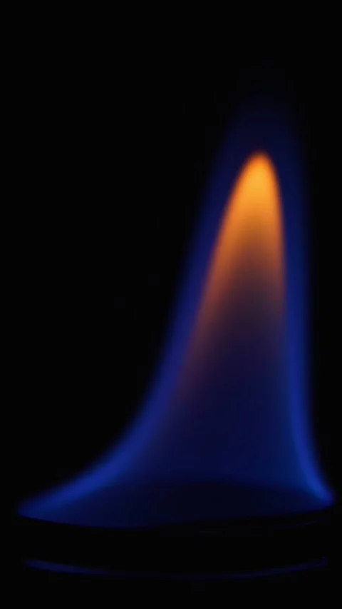 A burning flame in the dark. Burning alcohol in a test tube. Experience. Stock Footage 267646652