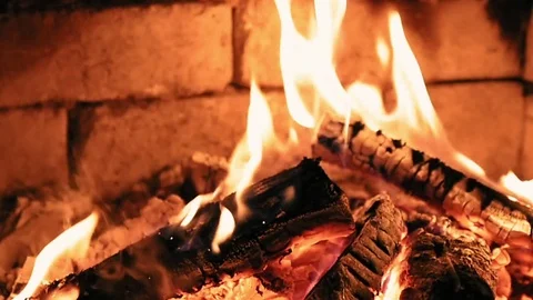 Burning flame fire in a fireplace. Slow motion. Stock Footage 70007860