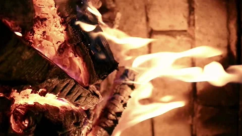 Burning flame fire in a fireplace. Slow motion. Stock Footage 90371669