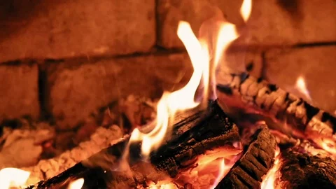 Burning flame fire in a fireplace. Warm and cozy. Stock Footage 70007363