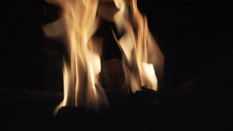 A burning flame on firewood On a black background Stock Footage 152349497