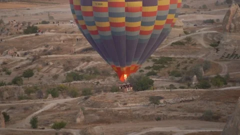 Burning flame of orange colour appears in hot air balloon Stock Footage 149645777
