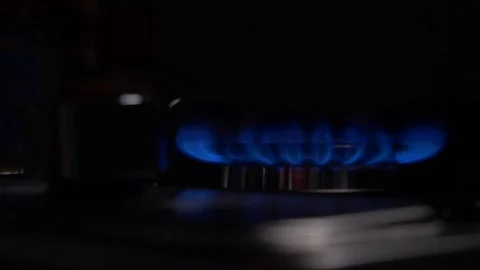Burning flames from different angles Stove top burner igniting Stock Footage 103972046
