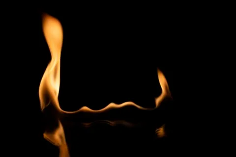 Burning flames of fire on a black background Stock Photos