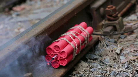 Burning fuse of dynamite attached to the rail. Stock Footage 50018446
