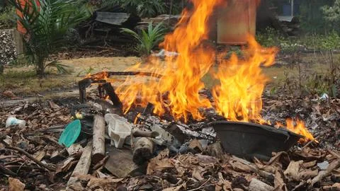 Burning Garbage in the Backyard Foto stock