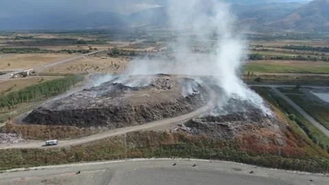 Burning Garbage Dump and Ecological Pollution Stock Footage 241705988