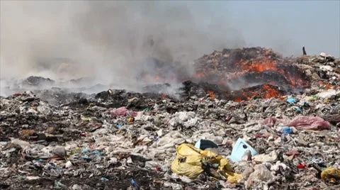 Burning garbage dump, ecological pollution Stock Footage