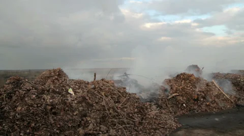 Burning garbage dump, ecological pollution. spontaneous garbage dump. Stock Footage 33037280