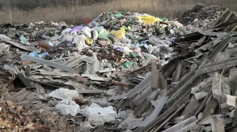 Burning garbage dump, ecological pollution. spontaneous garbage dump. Stock Footage 33037493