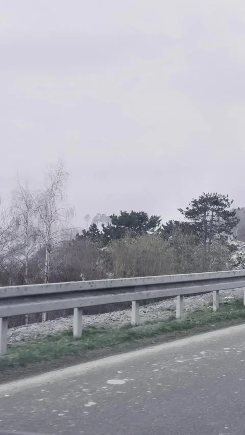 Burning Garbage Dump Near Road, Smoke from Landfill Environmental Pollution. 動画素材 332403451