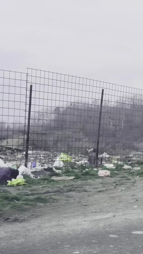 Burning Garbage Dump Near Road, Smoke from Landfill Environmental Pollution. Stock Footage 332403465