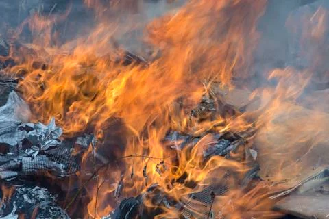 Burning garbage dump Foto stock