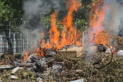 Burning garbage dump Stock Photos