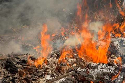Burning garbage dump Stock Photos