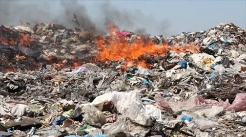 Burning garbage dump, pollution Stock Footage 8551367