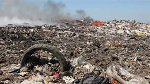 Burning garbage dump, pollution Stock Footage