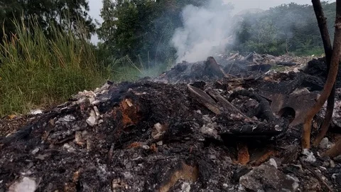Burning garbage dump pollution in thailand 4 Stock Footage 92674354