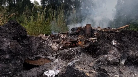 Burning garbage dump pollution in thailand 5 Stock Footage 92674367