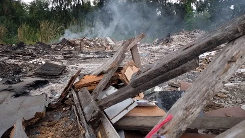 Burning garbage dump pollution in thailand Stock Footage 92675961
