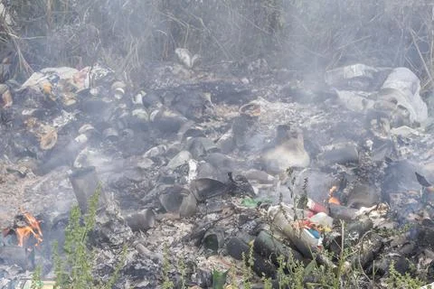Burning of garbage. Stock Photos