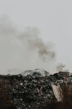 Burning garbage polluting the atmosphere Stock Photos