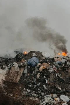 Burning garbage polluting the atmosphere Stock Photos