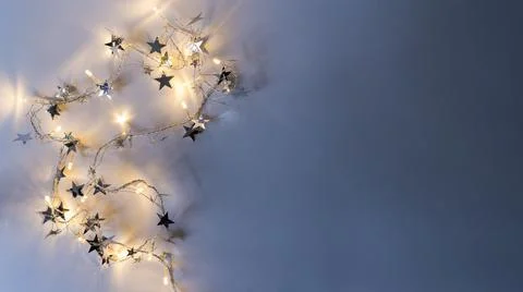 Burning garland with spangles table. High quality photo Stock Photos