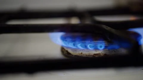 Burning gas on the stove at home Stock Footage