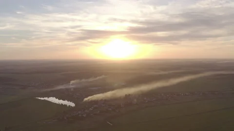 Burning grass in the field. the start of the fire. at sunset a field in smoke Stock Footage 138362005